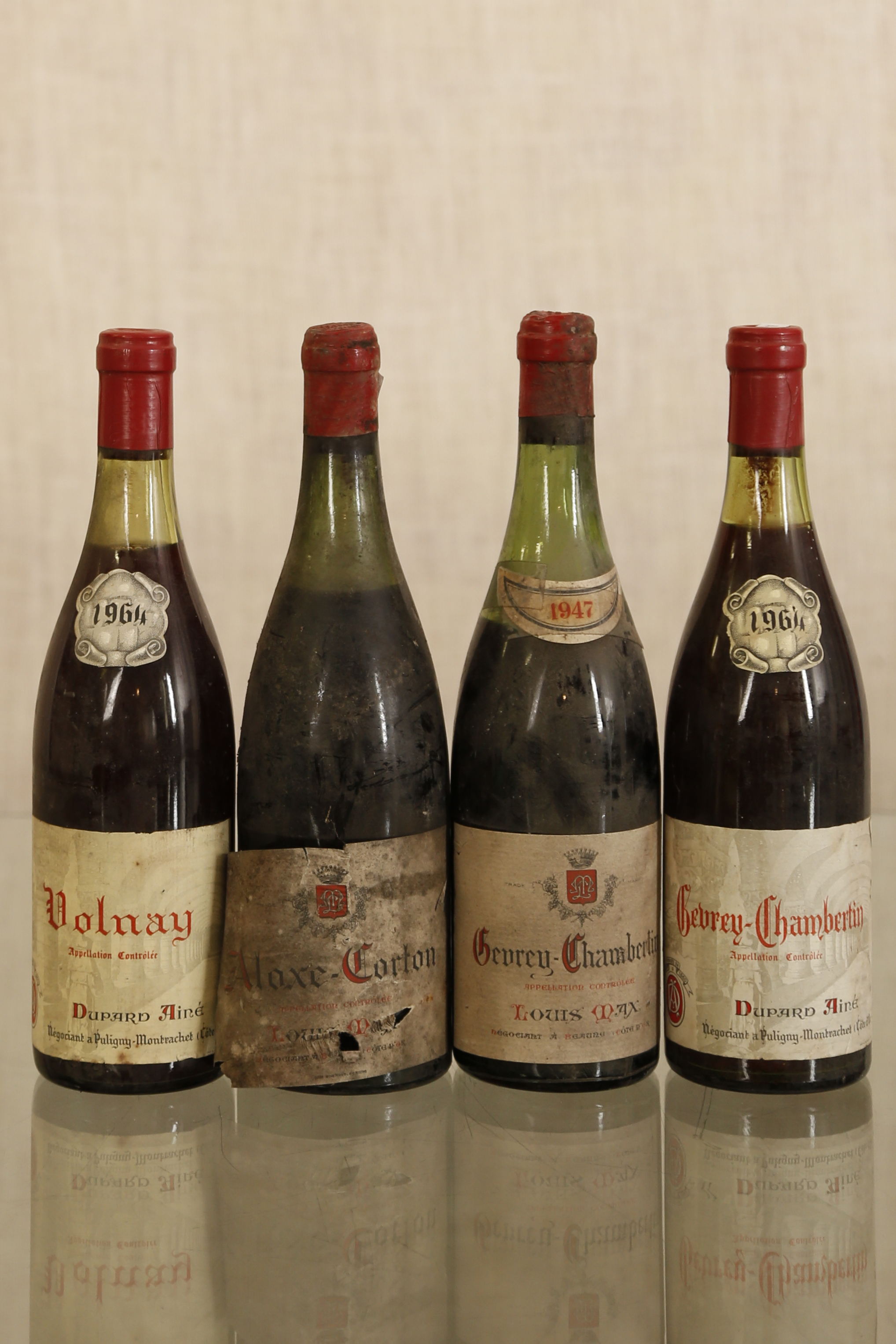 Ensemble de 4 bouteilles comprenant :