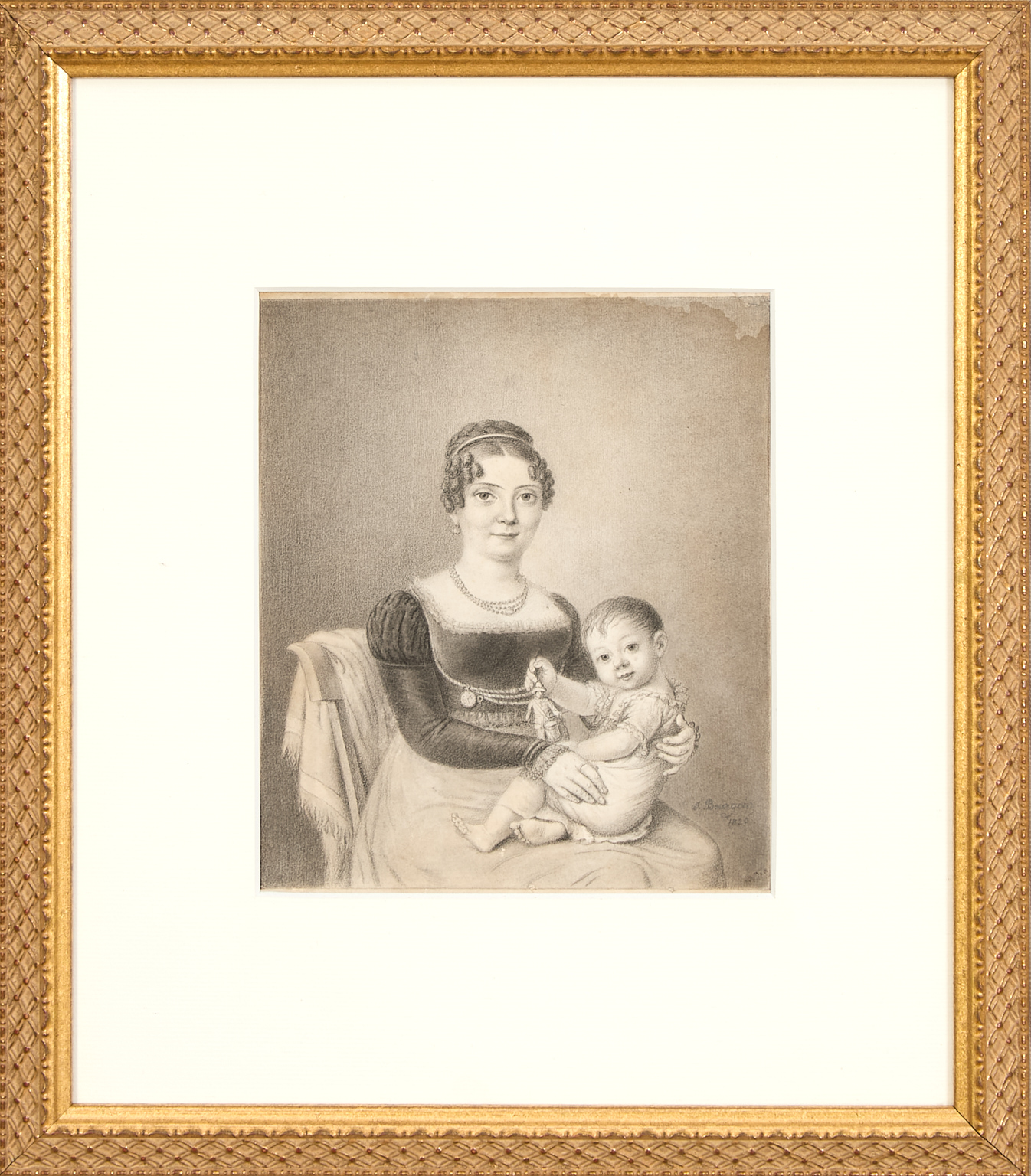 Femme et enfant à la figurine joueur de tambour