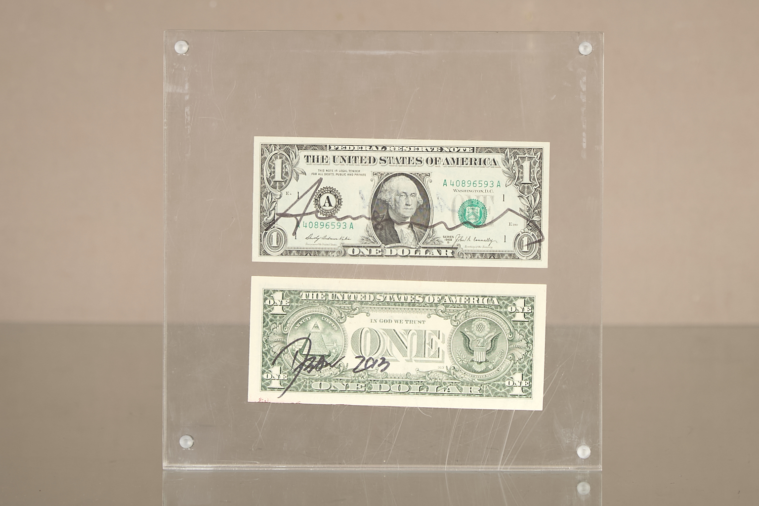 One dollar bill + Fuck Money