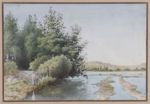 Pêcheur au bord d’une rivière