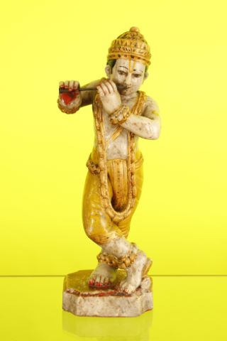 Krishna jouant de la flûte