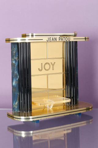 Vitrine publicitaire rétroéclairée pour le parfum Joy