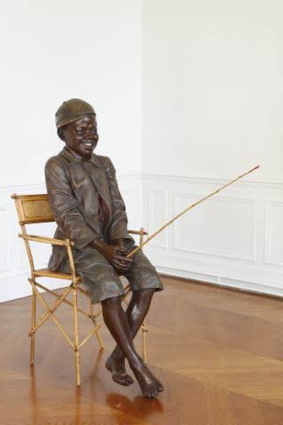 Jeune homme à la canne à pêche