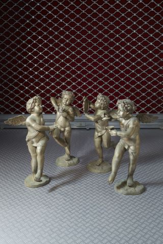 Quatre putti musiciens