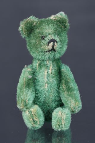 Rare ourson en peluche formant flacon de parfum