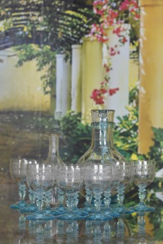 12 verres + 1 carafe + 1 flacon