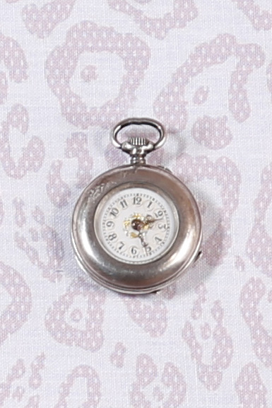 2 petites montres de col