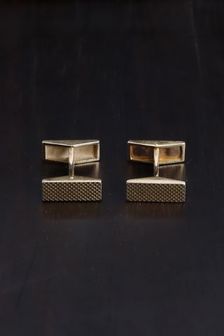 Ensemble en or jaune (18K, 750‰) comprenant :