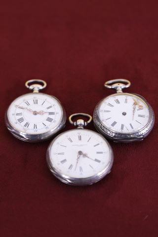 Lot de 12 montres de poche à clé