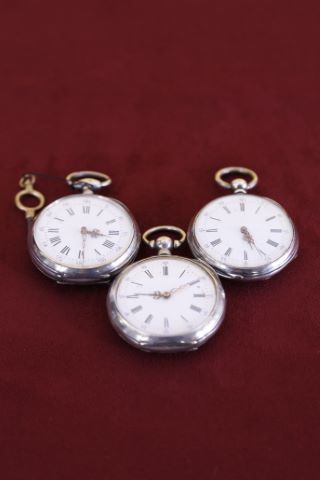 Lot de 12 montres de poche à clé