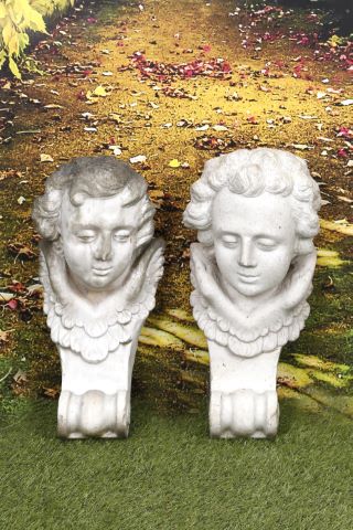 Suite de 2 têtes d’anges