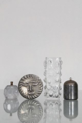 Ensemble en verre et métal
