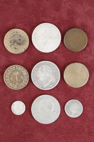 9 monnaies
