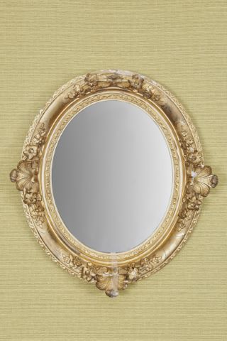 Miroir ovale d’époque Restauration