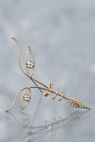 Broche visage