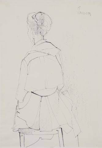 Femme assise de dos