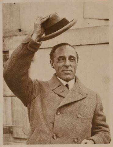Keystone View Company D. W. Griffith toiling in...