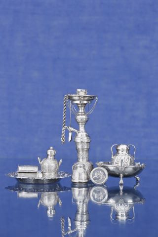 8 pièces en argent