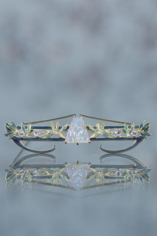 Broche au grillon