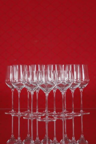 11 verres à vin blanc jeune et 9 verres à…