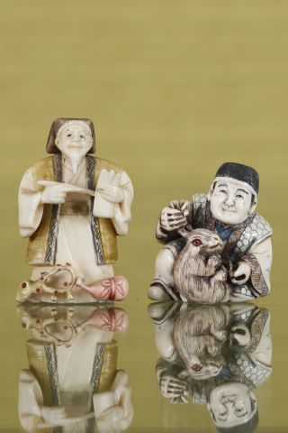 2 netsukes représentant 1 personnage de lettré et 1 autre…