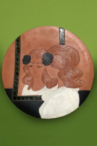 Femme à la fenêtre
