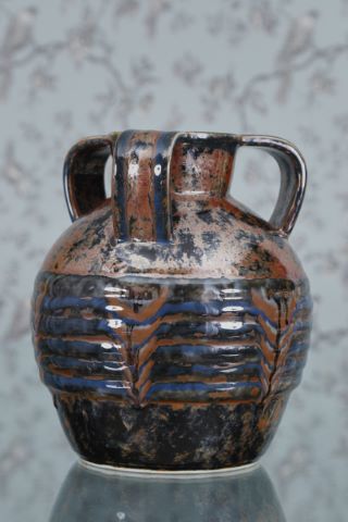 Vase de forme boule à 3 anses