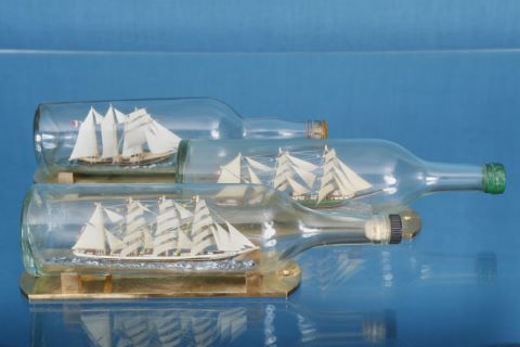 3 bateaux en bouteille