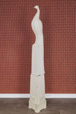 Paon sur une colonne