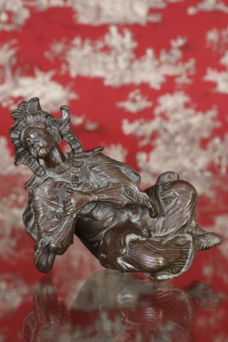 Bronze d’ornement figurant un Chinois au chapeau