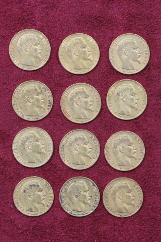 12 pièces de 20 francs or Napoléon III tête nue