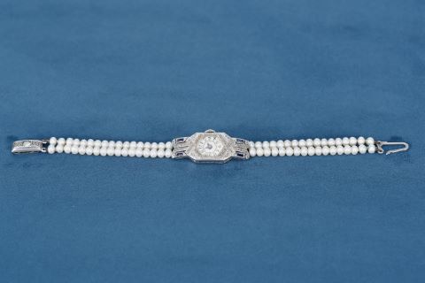 Montre de dame + 1 bracelet