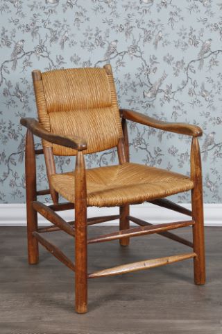 Charlotte Perriand (1903-1999) Fauteuil dit paillé