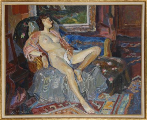 Nu féminin alangui sur une méridienne