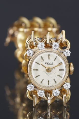 Montre manchette de dame
