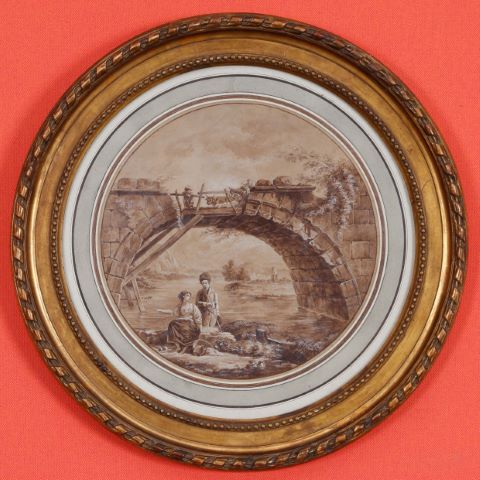 Femmes au bord de la rivière sous un pont