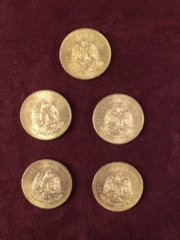 5 pièces de 50 pesos