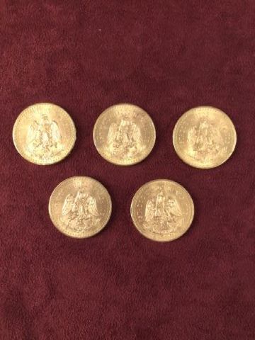 5 pièces de 50 pesos